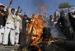 People burn an effigy of the US President Barack Obama during a protest in Jalalabad, east of Kabul, Afghanistan, Thursday, Jan. 7, 2010. Afghans Hold Anti-US Rally over Killing of Civilians