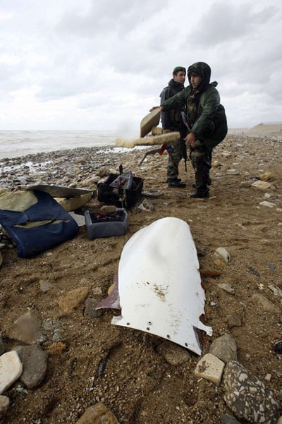Photo Report: Ethiopian Plane Wreck Starts to Emerge 