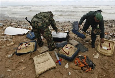 Photo Report: Ethiopian Plane Wreck Starts to Emerge 