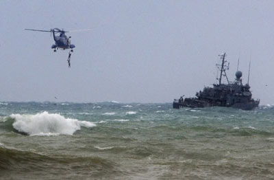Photo Report: Ethiopian Plane Wreck Starts to Emerge 