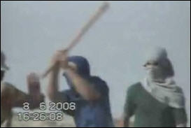"Israeli" settlers beating Palestinians