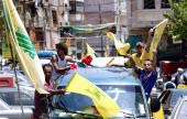 Lebanese celebrate the Resistance's Operation Recalling Images of July 12, 2006