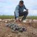 UN teams halt cluster-bomb clearance as funds dry up ~ De-miners expect surge in civilian casualties