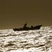 “Israeli” warships bombard Gaza fishing boat 