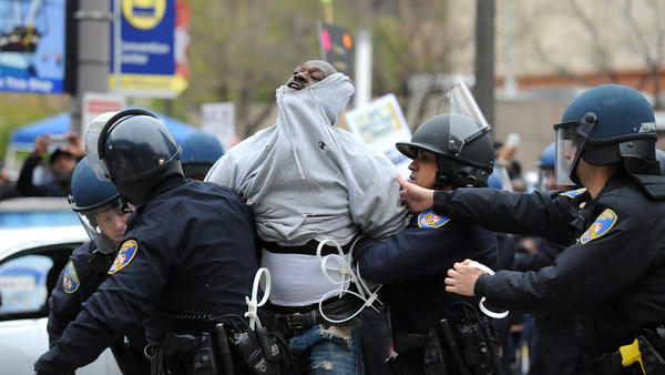 US City under Curfew, Tensions Escalate over Black Teen’s Death