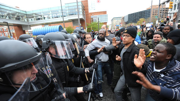 US City under Curfew, Tensions Escalate over Black Teen’s Death