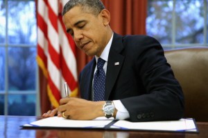 Obama Signs Budget Deal, Military Bill