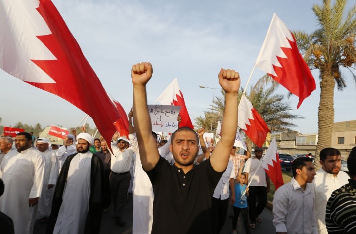 Anti-regime demonstrators at a rally organised by Bahrain's main opposition group, Al-Wefaq Bahrain Bans Main Opposition for 3 Months Ahead of Key Elections