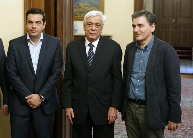Greece's Prime Minister Alexis Tsipras, Greek President Prokopis Pavlopoulos, and the new Greek Finance Minister Euclid Tsakalotos