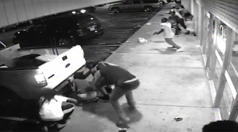 Surveillance Footage Shows Ferguson Protester Shot by Cops Had Pistol

