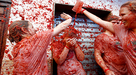 Annual Tomato Battle Paints Streets of Spanish Town Red