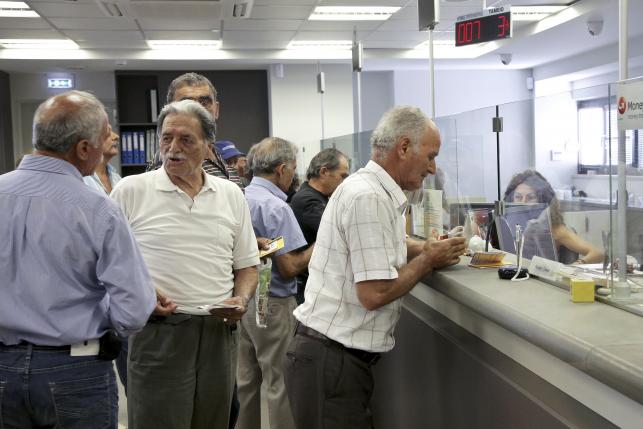 Banks Reopen, Taxes Hiked as Greece Seeks to Reboot Economy