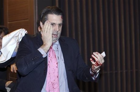 US Ambassador Slashed and Bloodied in Seoul Attack
