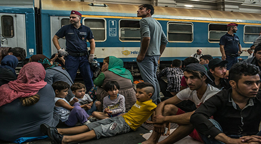 Refugees in train station 