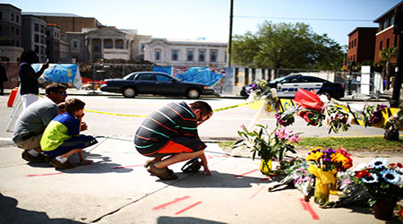 Church Massacre Suspect Held as Charleston Grieves