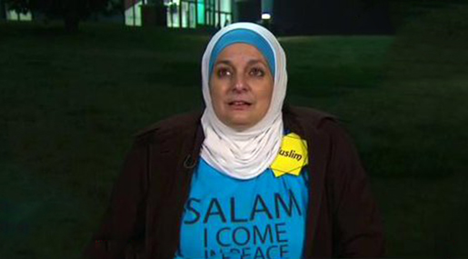 Silently Protesting Muslim Woman Ejected from Donald Trump Rally
