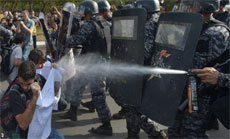 Brazilian Protesters Clash with Riot Police