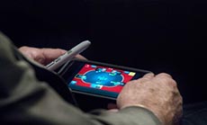 McCain Plays Phone Game at Syria Debate