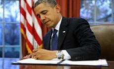 Obama Signs Budget Deal, Military Bill