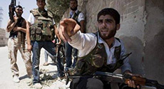 Syria Militants Lay Siege to Qaeda-Linked Extremists, Kill Numerous in Raqa