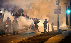 U.S. Police Arrest 31 People Including Journalist Amid Ferguson Protests