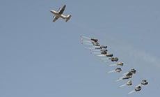 US Drops Weapons to Kurds in Kobani Weeks after Airstrikes 