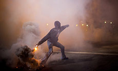 Tension Escalates in Baltimore As Protesters Defy Curfew