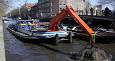 People Paid Full-Time to Fish for Bikes in Amsterdam

