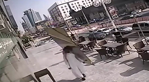 Huge Glass Panel Falls Inches from Saudi Man’s Head

