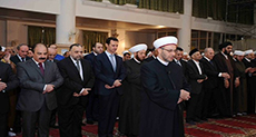 Assad Makes Rare Public Appearance for Eid Prayers

