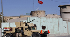 Turkish Troops Pull Out from Camp Outside Mosul
