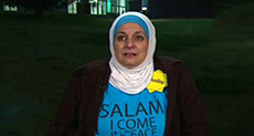 Silently Protesting Muslim Woman Ejected from Donald Trump Rally
