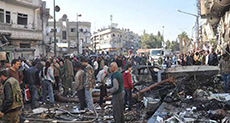 Dozens Martyred in Double Bombing in Homs, Syria
