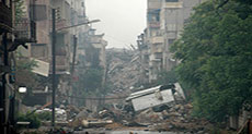 Twin Terrorist Bombings Martyr 10 Civilians in Syrian Homs 