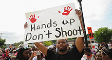 Racist Killings Prompt Travel Warnings against US
