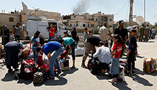 Residents of Liberated Darayya Get Rid of Useless Militant-Issued Passports