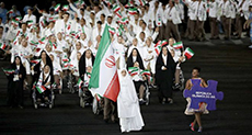 Covered with Ihram, Iran Protest Saudi «Hajj Stampede» in Rio Paralympics
