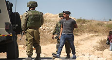 ’Israeli’ Forces Detain 2 Palestinians during Bilin Protest