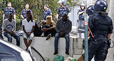 Italy Police Arrest People Smuggler at French Border