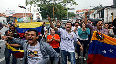 Protests Brew in Venezuela as Maduro Denies Coup