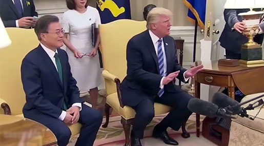 Donald Trump Chides Reporters in Chaotic Oval Office Photo Op