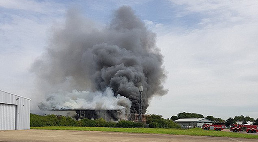 UK Airport Explosion: Firefighter Battle Blaze in Hangar