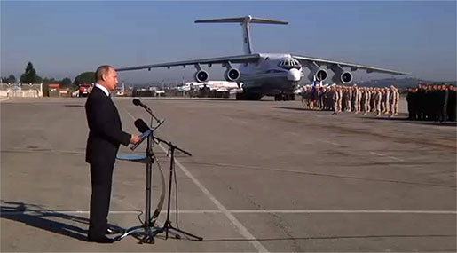 Putin Visits Syria, Orders Withdrawal of Russian Troops