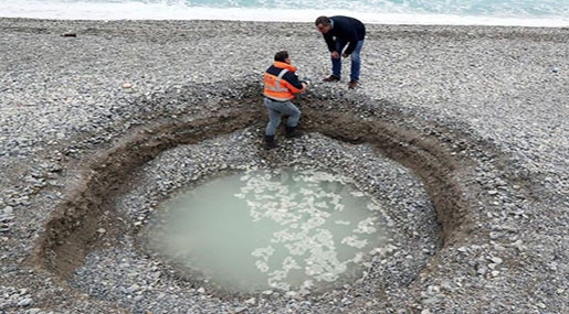 Big Crater Seen on Beach in French Riviera