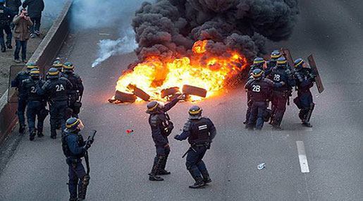 May Day Riot: Masked Protesters Torch Cars As Paris Police Deploy Tear Gas, Arrest 200