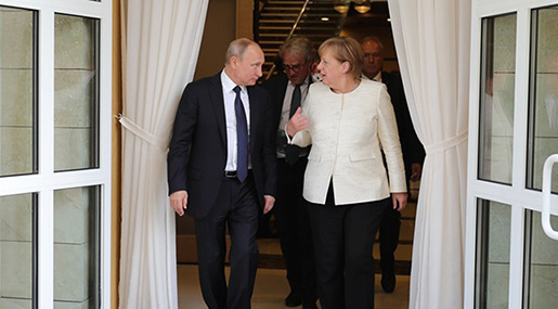 Putin, Merkel Discuss Defense against Trump’s Sanctions Drive
