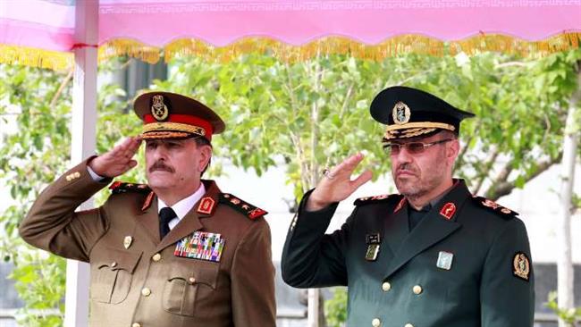 Iran’s Defense Minister Brigadier General Hossein Dehqan and Syrian Defense Minister Fahd Jassem al-Freij 