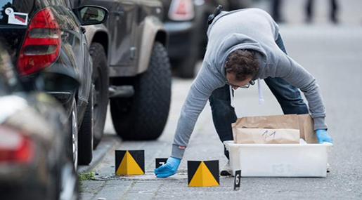 Investigators collecting evidence at Colonge shooting scene 