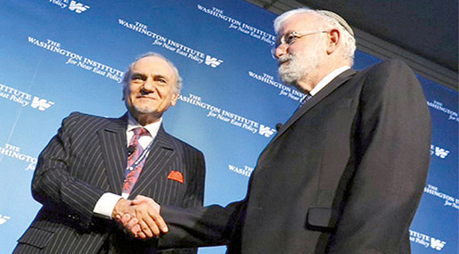 Prince Turki al-Faisal Al Saud of Saudi Arabia (L) and retired 