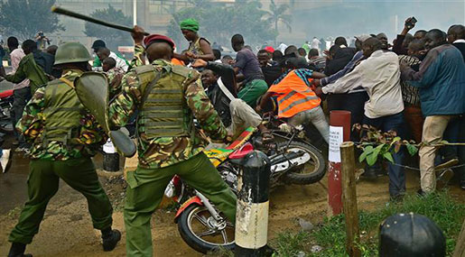 Kenyan police beating up protesters 